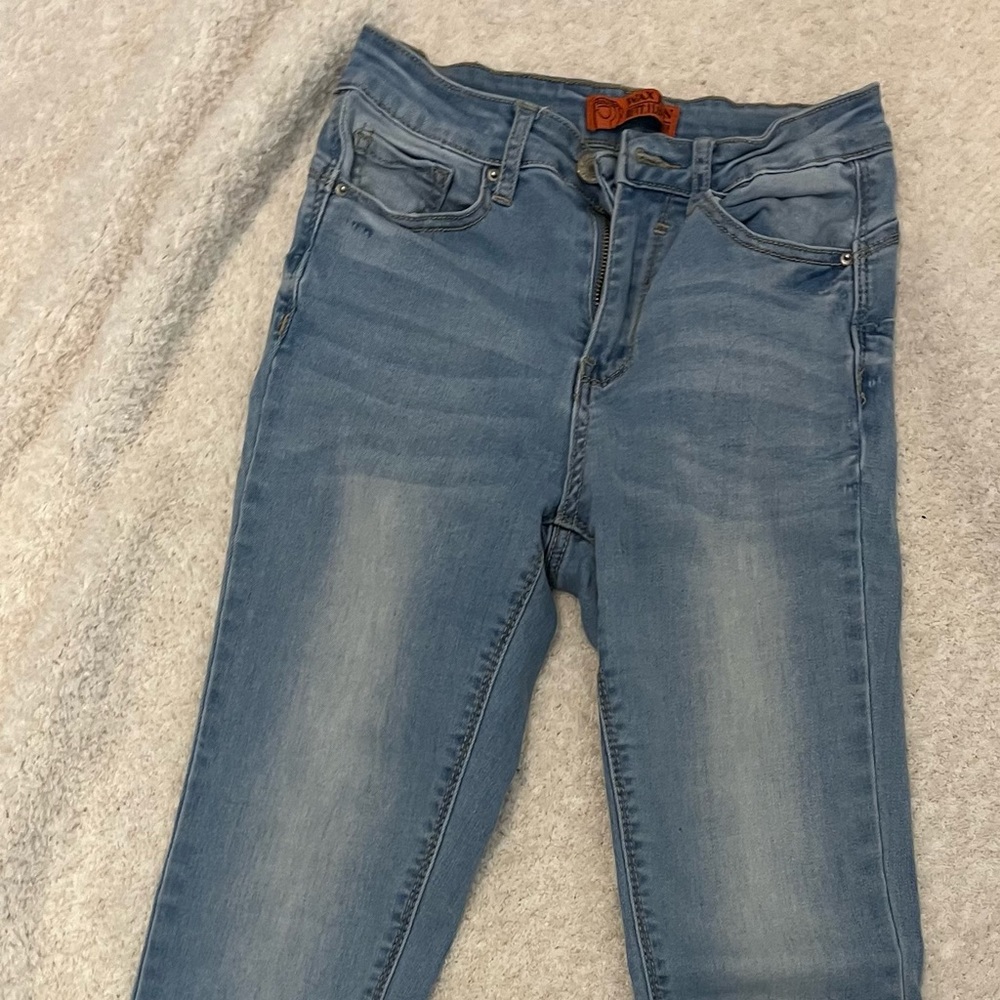 light wash stretchy skinny jeans - size 3